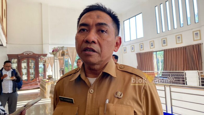 Kepala Bappeda Kabupaten Malang, Tomie Herawanto saat ditemui awakmedia (blok-a.com/ Putu Ayu Pratama S)