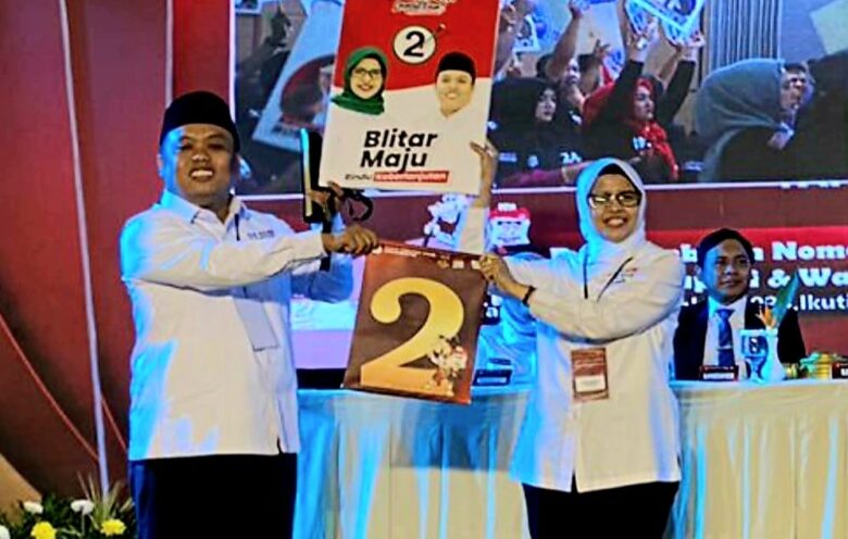 Paslon Bupati dan Wakil Bupati Blitar, Rini Syarifah (Mak Rini) dan Abdul Ghoni (Mas Ghoni) dapat nomor urut 2 di Pilkada Kabupaten Blitar 2024. (blok-a.com/Fajar)