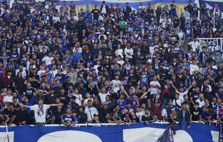 Aremania, suporter Arema FC berharap dualisme Arema segera berakhir (ist)