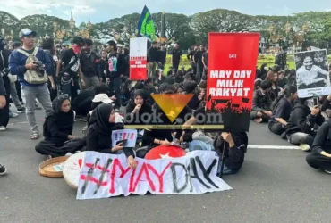 Aksi memperingati May Day yang digelar di depan Gedung DPRD dan Balai Kota Malang pada Jumat (1/5/2026) (foto: Blok-a.com / Berril Labiq)