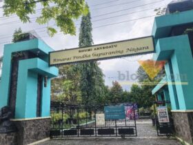 Tampak depan SMPN 4 Malang yang berdiri di lahan UM (blok-a/Bob Bimantara Leander)