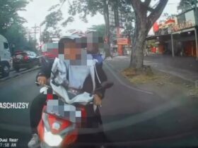 Tangkapan layar pengendara motor yang menabrak mobil di Kota Malang (foto: istimewa)