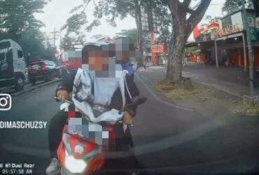 Tangkapan layar pengendara motor yang menabrak mobil di Kota Malang (foto: istimewa)