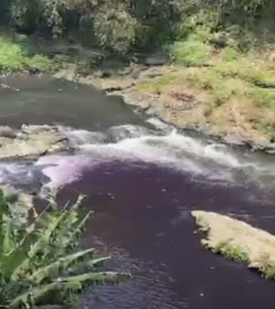 Air Sungai Brantas di kawasan Mergosono Gang 5, Kota Malang, mendadak berubah warna menjadi ungu (foto: istimewa)