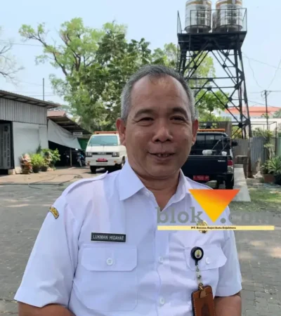Kepala Bidang Perumahan dan Kawasan Permukiman DPURPKP Kota Malang, Lukman Hidayat saat diwawancarai wartawan (foto: blok-a.com / Yogga Ardiawan)