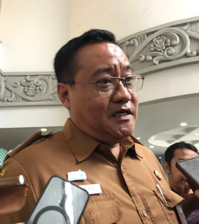 Kepala Bakesbangpol Kota Malang, Noer Rahman Widjaya saat diwawancarai awak media (Istimewa)